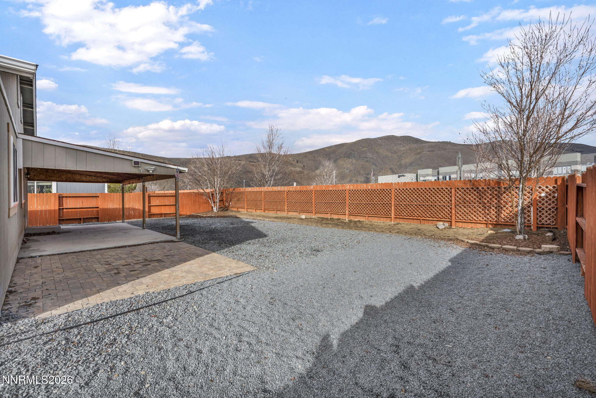 17725 Live Oak Court Reno, NV 89508 - Photo 14 of 44 a view of backyard with large trees