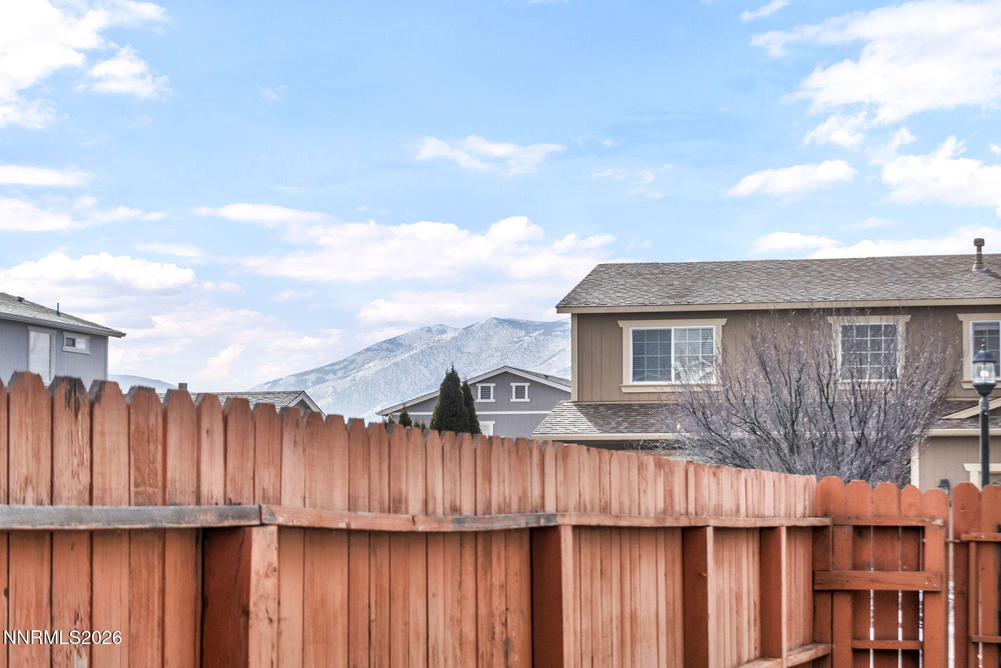 17725 Live Oak Court Reno, NV 89508 - Photo 18 of 44 a view of outdoor space with deck and wooden fence