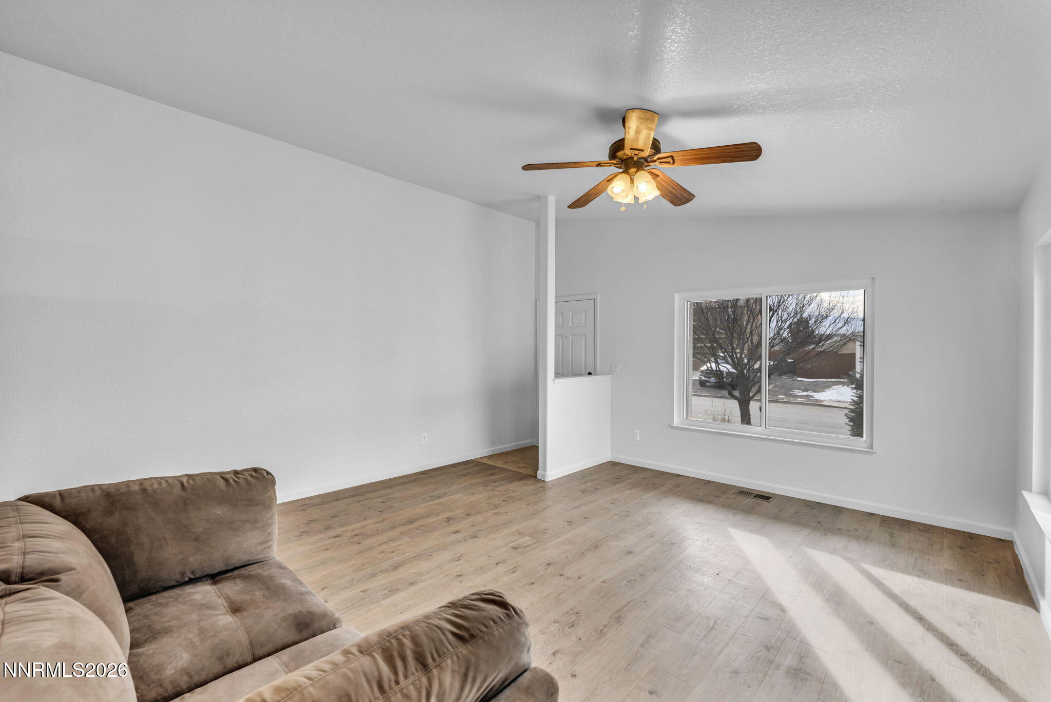 17725 Live Oak Court Reno, NV 89508 - Photo 23 of 44 a living room with furniture and a window