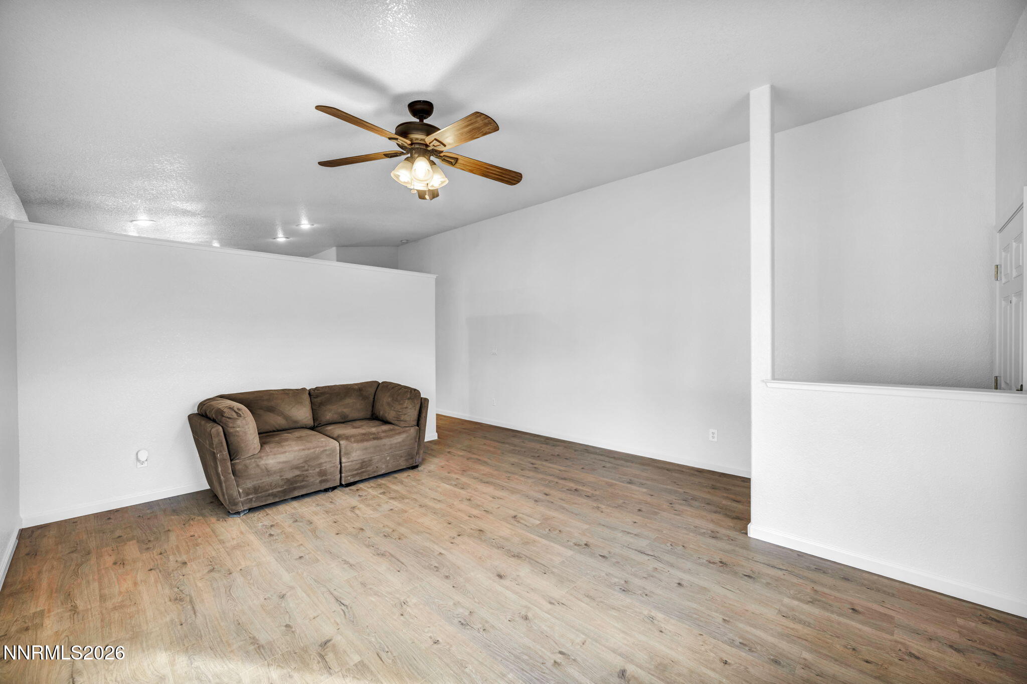 17725 Live Oak Court Reno, NV 89508 - Photo 24 of 44 a view of livingroom with a ceiling fan