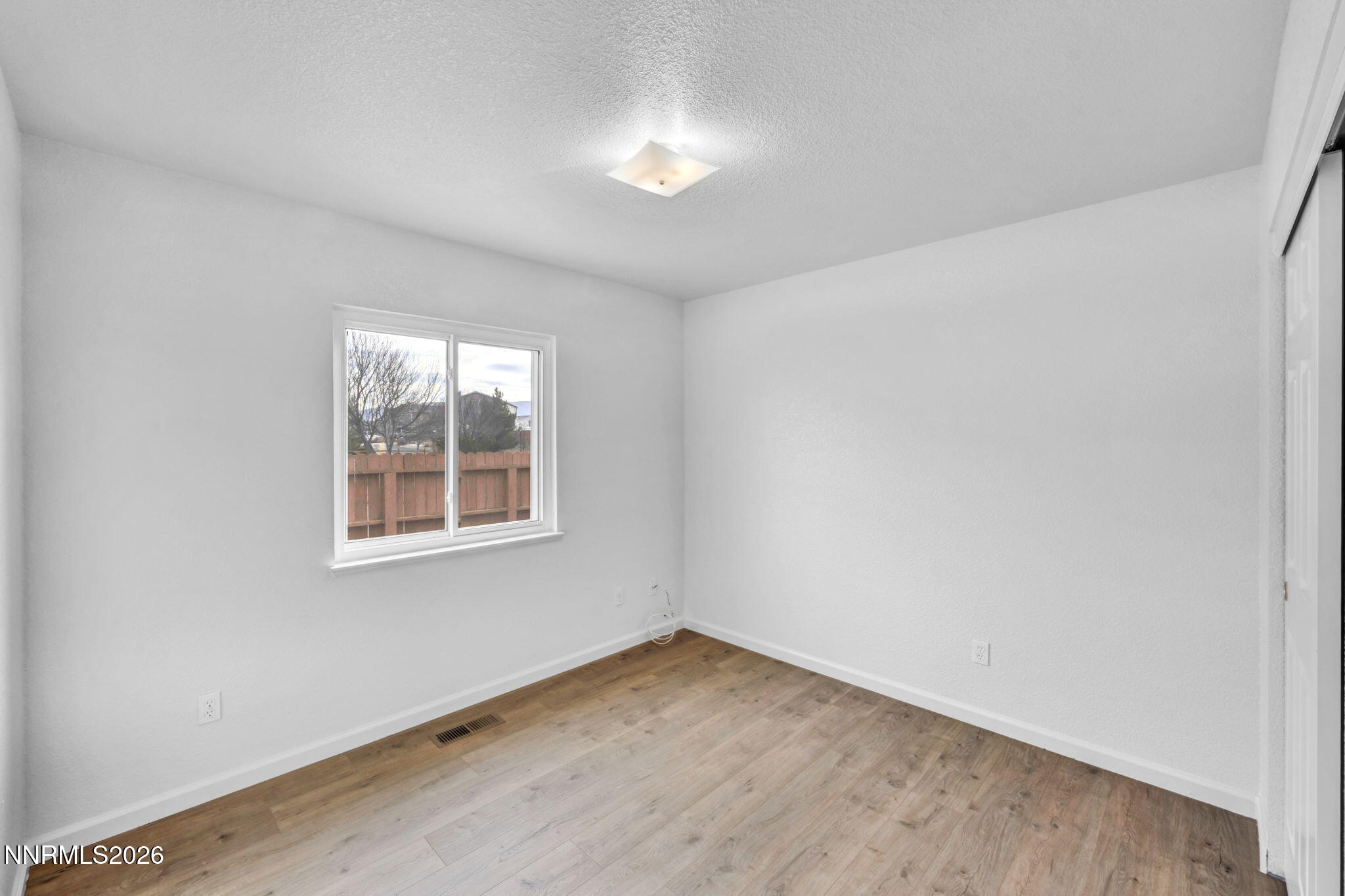 17725 Live Oak Court Reno, NV 89508 - Photo 39 of 44 an empty room with a window