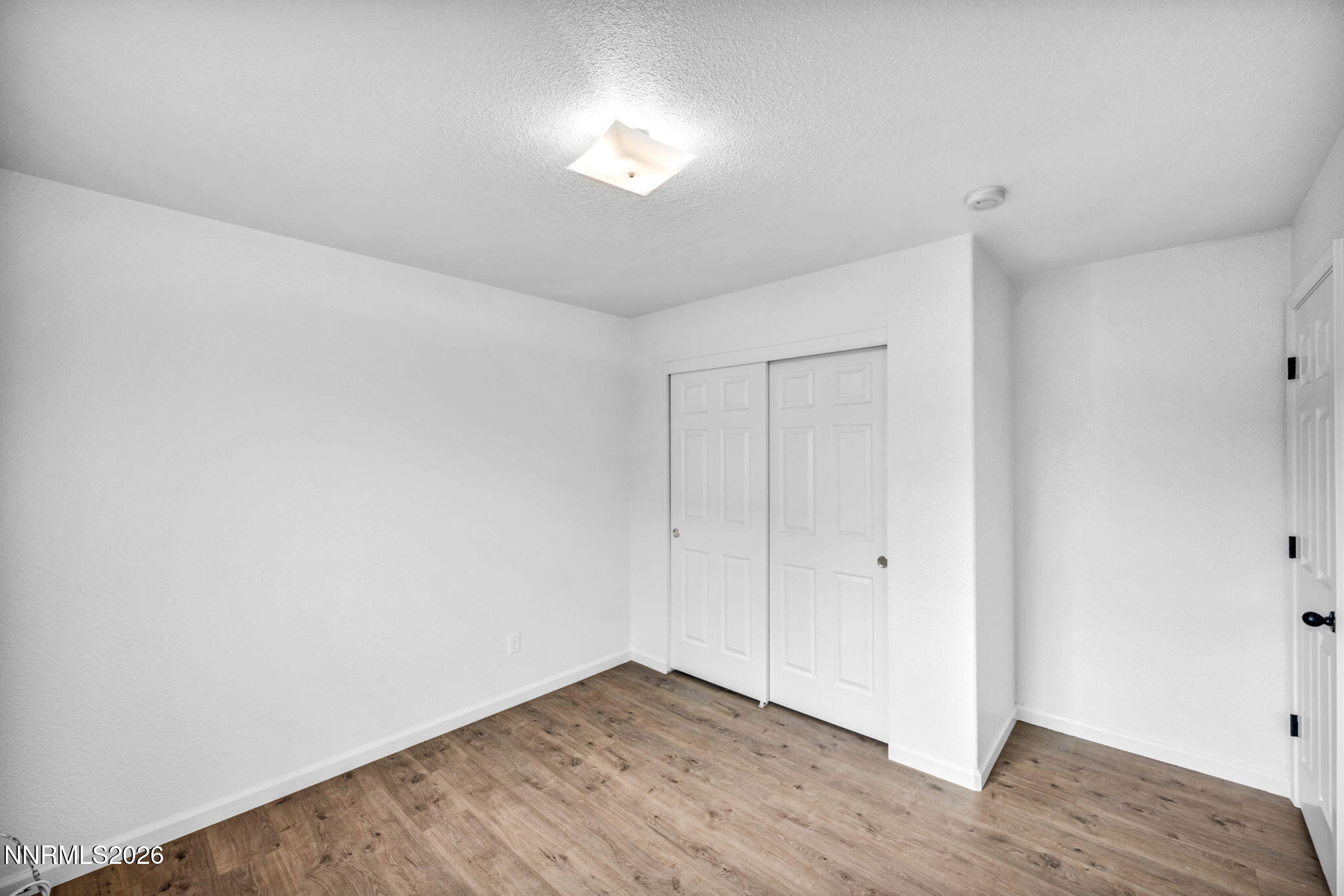 17725 Live Oak Court Reno, NV 89508 - Photo 40 of 44 a view of an empty room and wooden floor