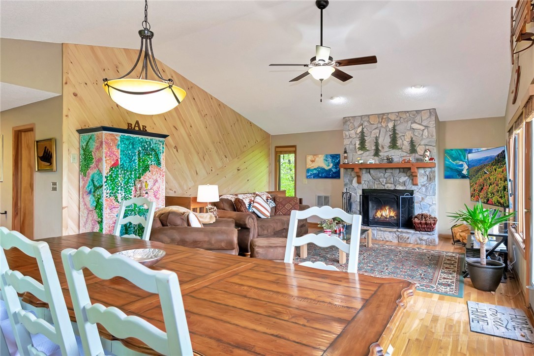 1078 Charter Hills Road Beech Mountain, NC 28604 - Photo 12 of 50 a living room with furniture and a fireplace