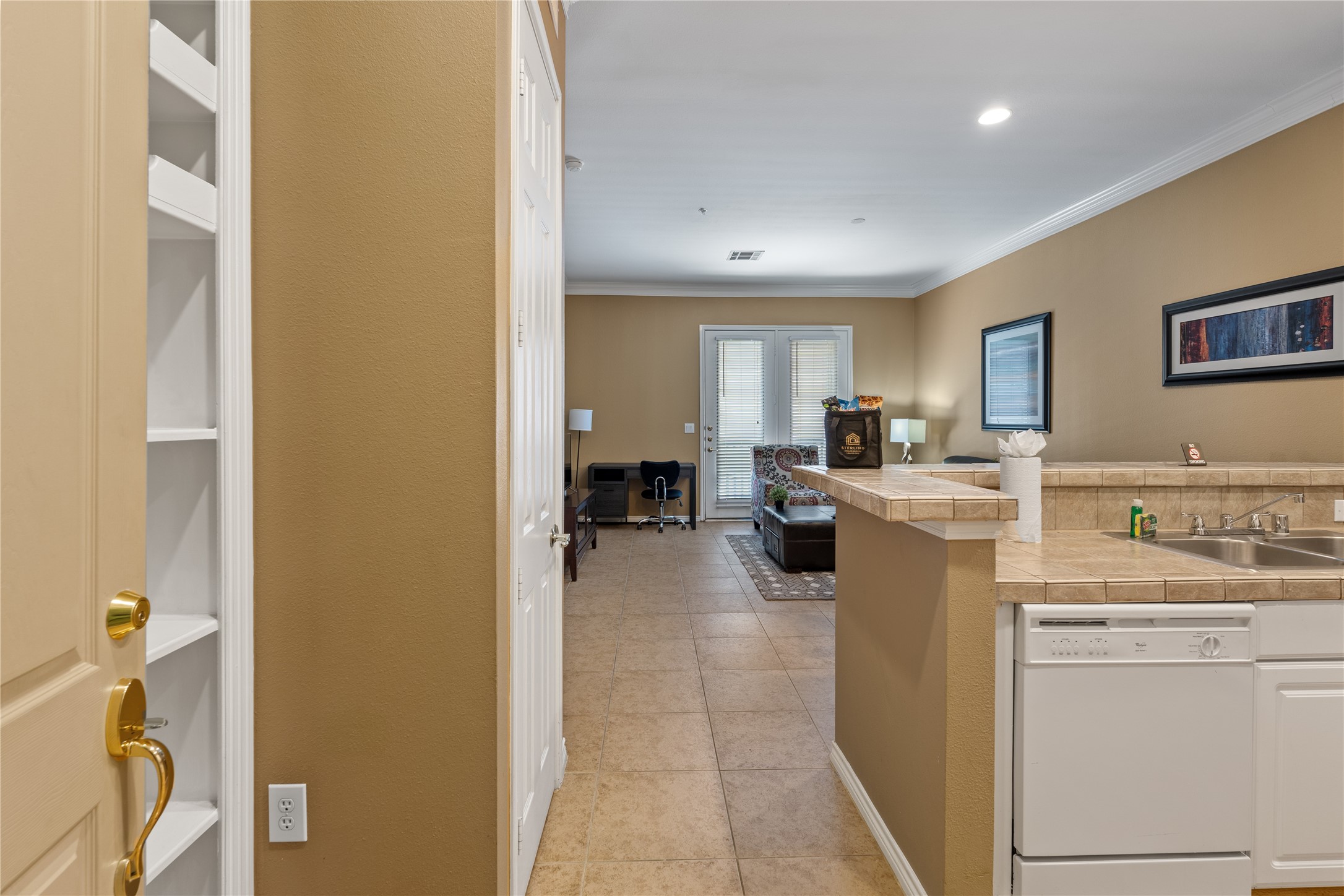 2400 McCue Road, Unit 218 Houston, TX 77056 - Photo 2 of 16 Built in bookshelves for storage