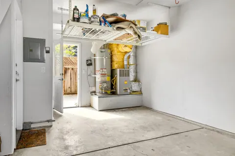 a view of entryway with furniture and wooden floor
