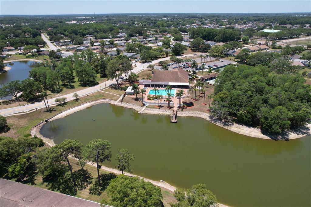 9319 Trowbridge Court New Port Richey, FL 34655 - Photo 78 of 78 an aerial view of a house with a yard