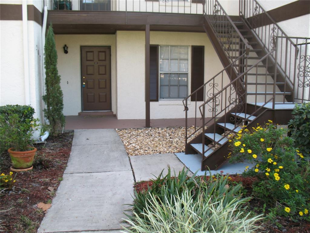 600 Northern Way, Unit 307 Winter Springs, FL 32708 - Photo 1 of 1 a view of a house with backyard and sitting area