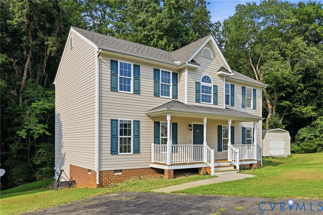 7610 Sugar Run Road Hopewell, VA 23860 - Photo 2 of 48 Two-story residence featuring light-toned siding,