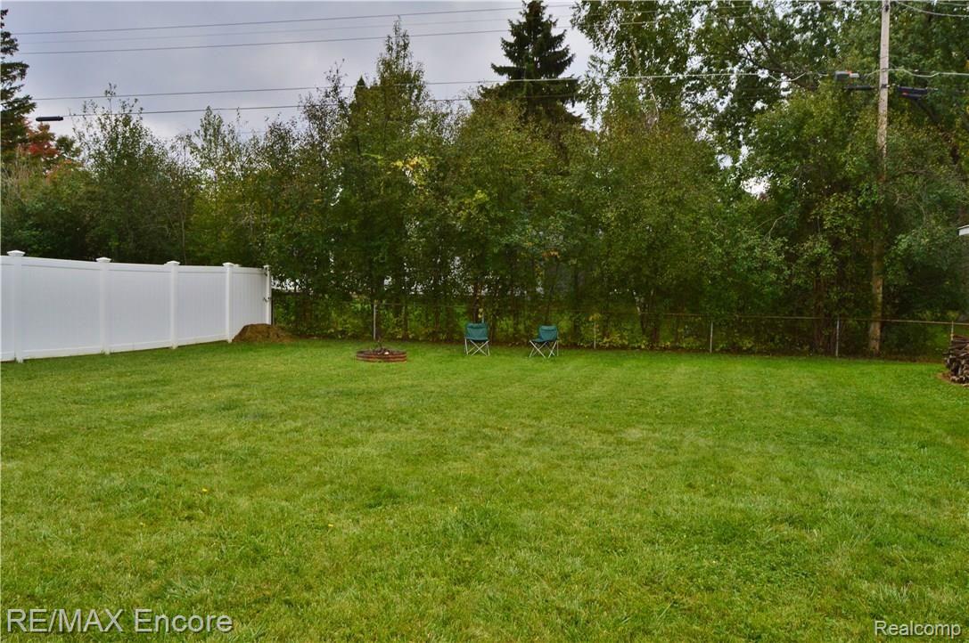 306 Fitzner Drive Davison, MI 48423 - Photo 28 of 32 Mostly fenced large backyard