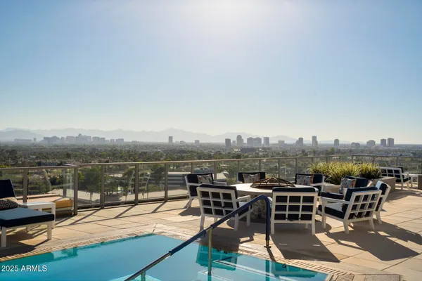 a view of a patio with couches table and chairs