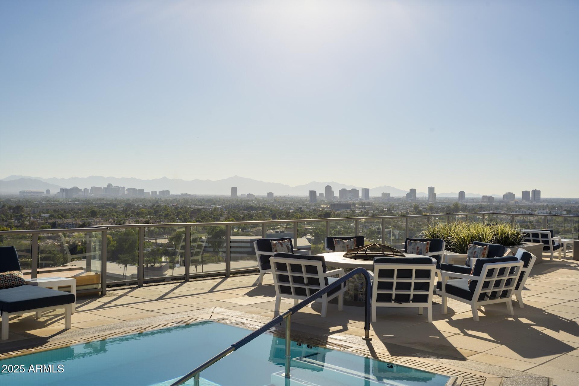 2211 East Camelback Road, Unit 1203 Phoenix, AZ 85016 - Photo 29 of 39 a view of a terrace with sitting area