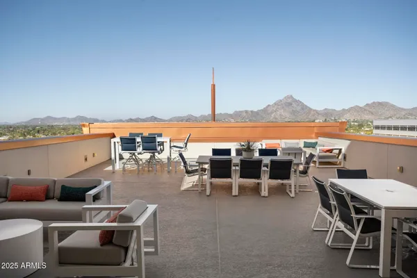 a view of a terrace with sitting area