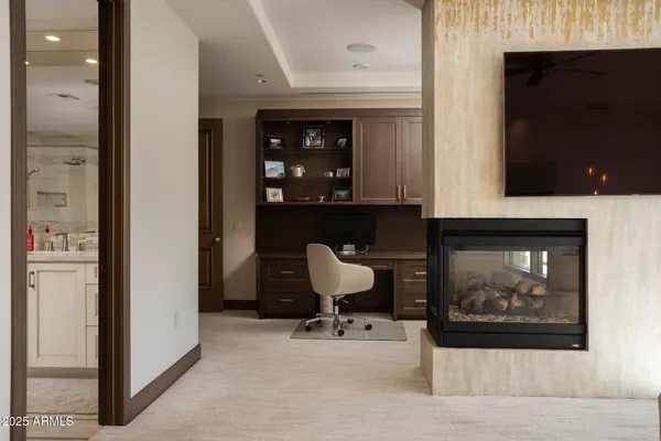 a bedroom with bed and window