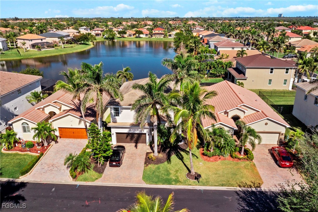 8657 Sumner Avenue Fort Myers, FL 33908 - Photo 1 of 29 an aerial view of residential houses with outdoor space