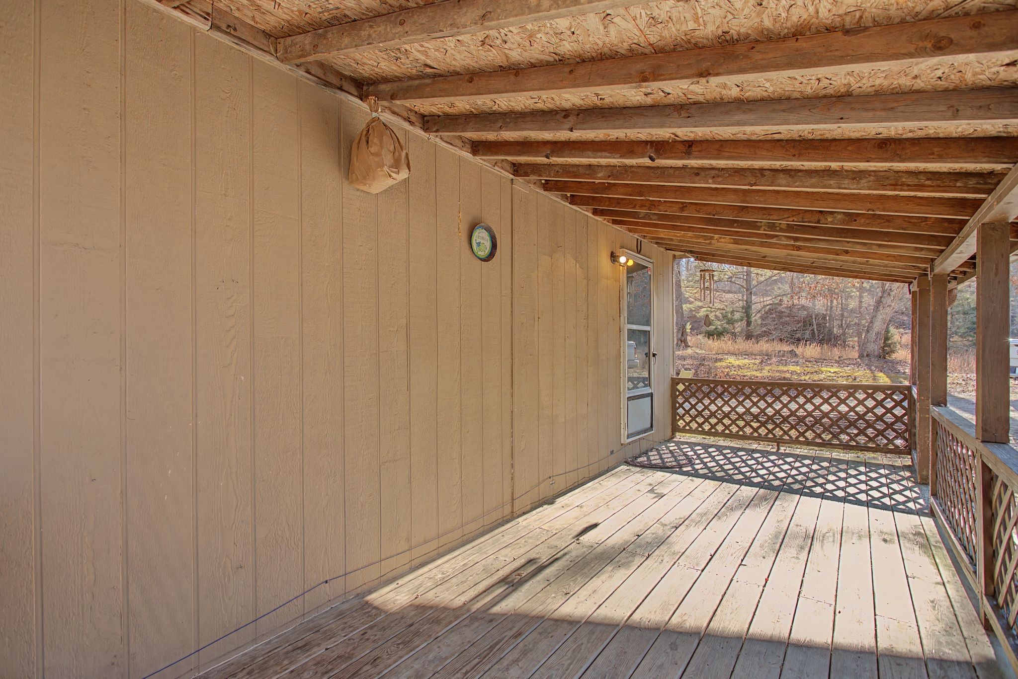 405 Napier Road Hohenwald, TN 38462 - Photo 15 of 37 a view of a room with wooden floor
