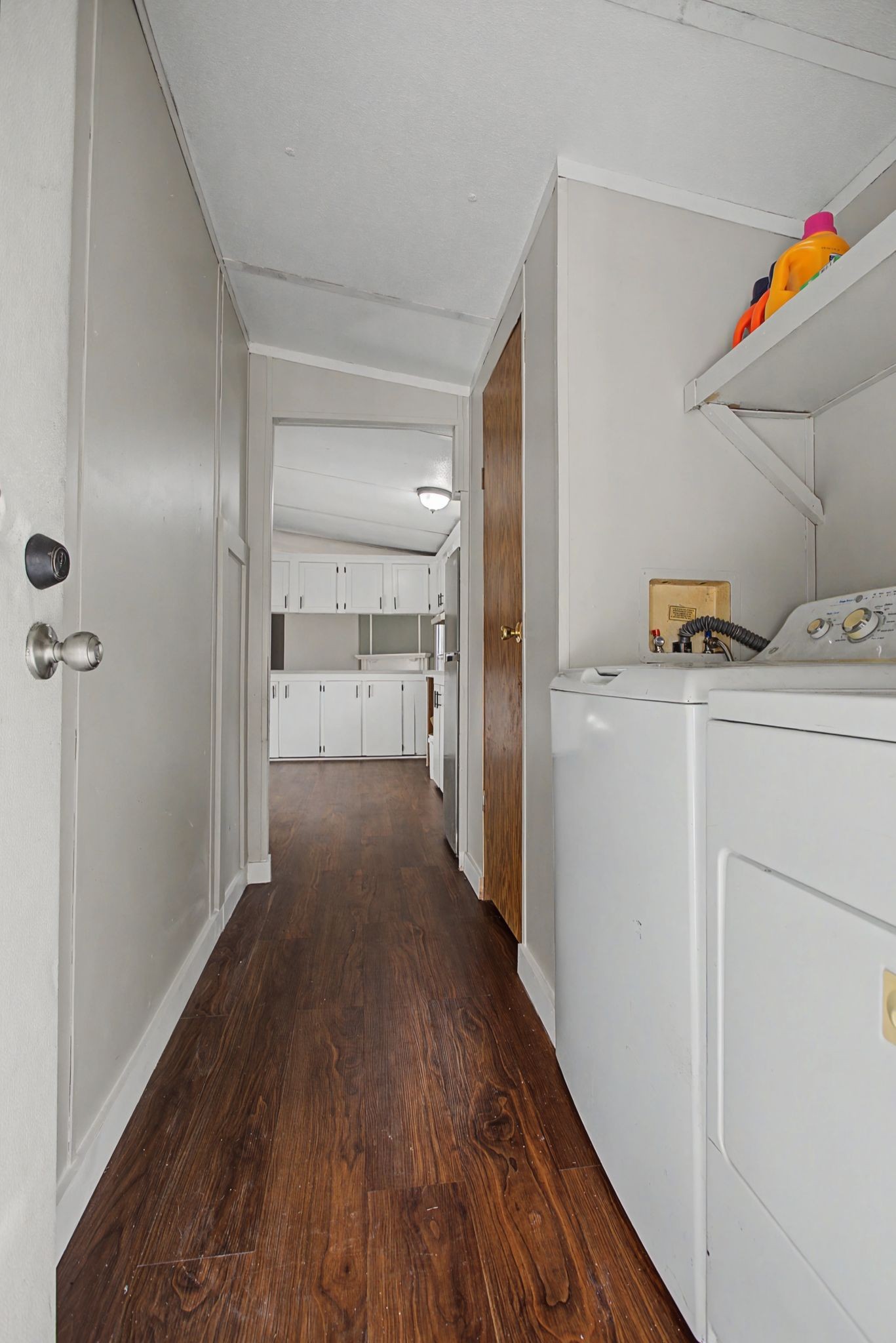 405 Napier Road Hohenwald, TN 38462 - Photo 17 of 37 a view of hallway with wooden floor