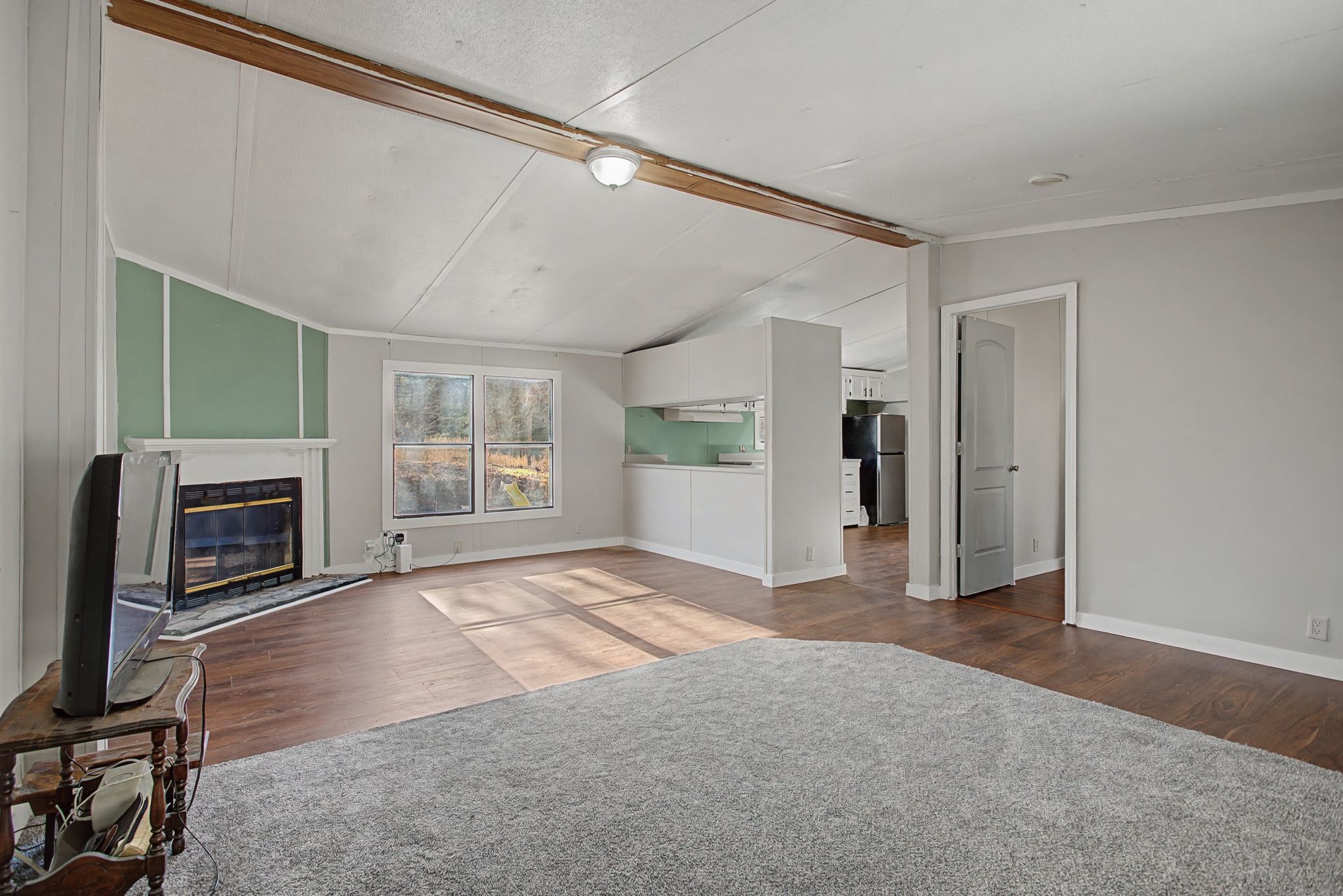 405 Napier Road Hohenwald, TN 38462 - Photo 3 of 37 a view of a livingroom with a fireplace