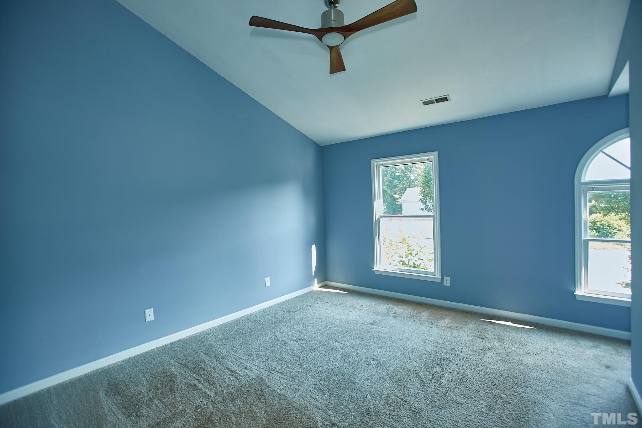 4616 Knightsbridge Way Raleigh, NC 27604 - Photo 18 of 27 an empty room with windows and closet