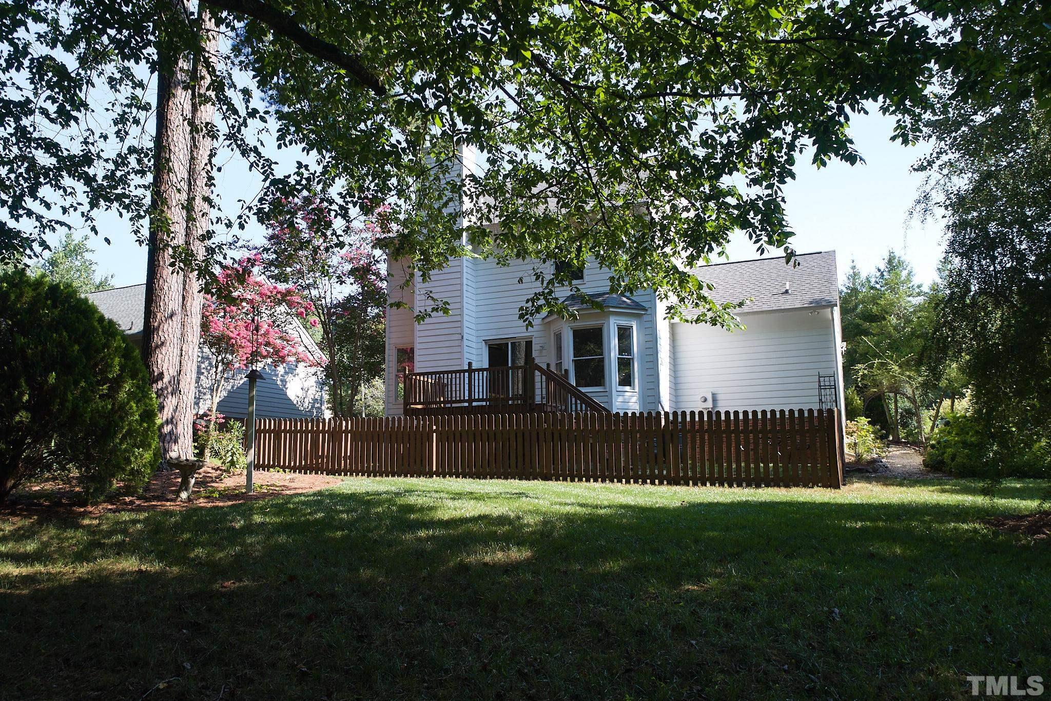 4616 Knightsbridge Way Raleigh, NC 27604 - Photo 27 of 27 a front view of a house with a garden