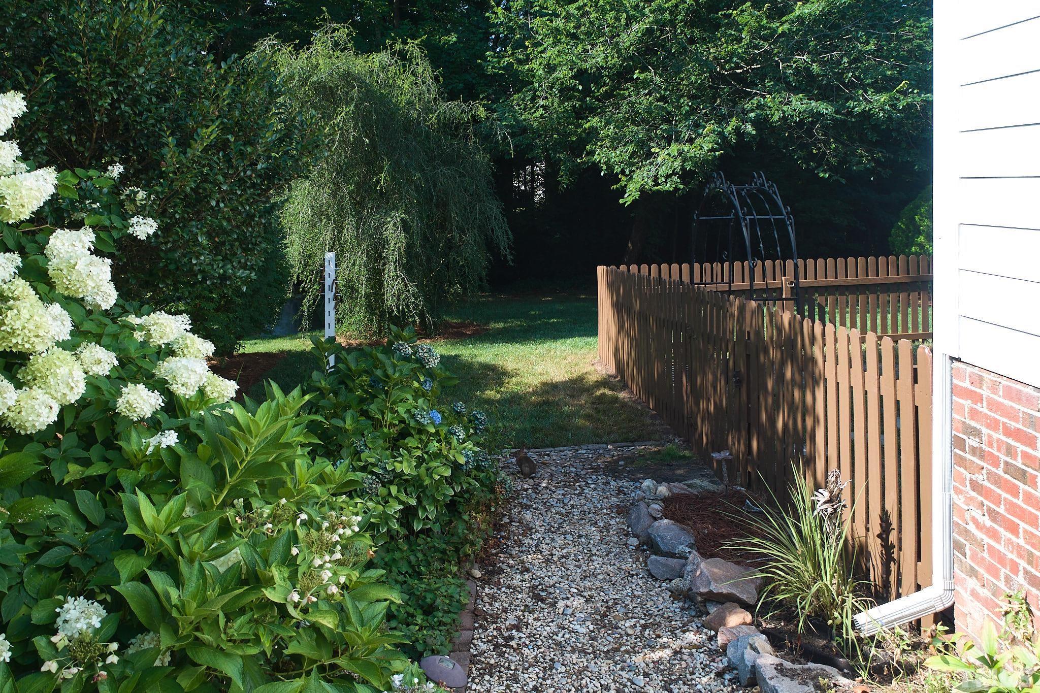 4616 Knightsbridge Way Raleigh, NC 27604 - Photo 4 of 27 a garden view