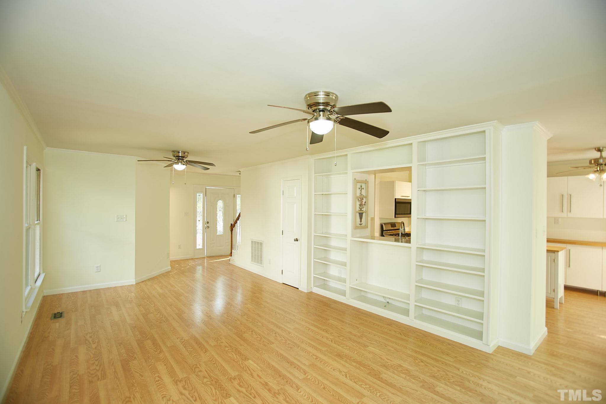 4616 Knightsbridge Way Raleigh, NC 27604 - Photo 9 of 27 a view of empty room with wooden floor and fan
