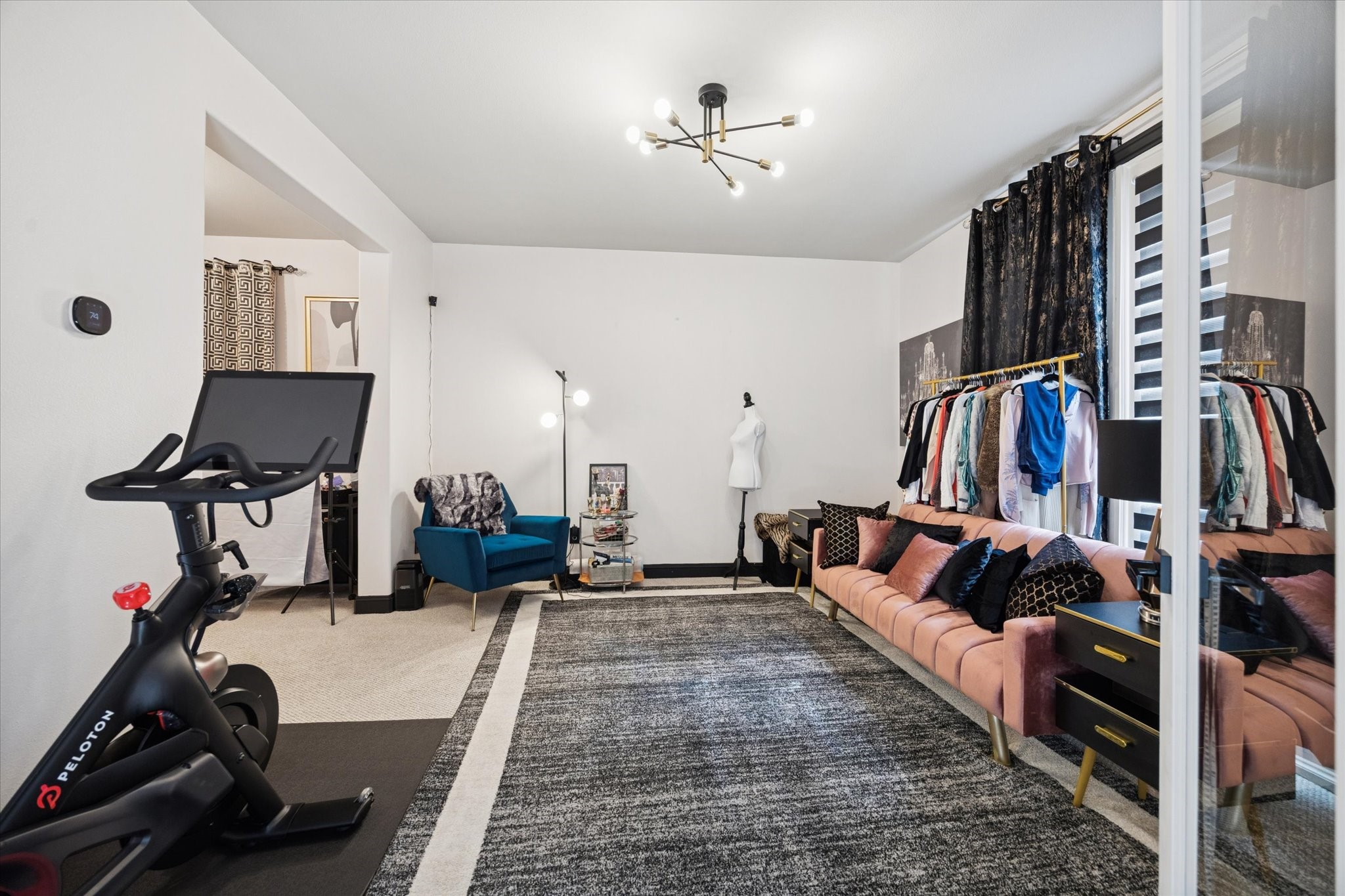 5820 Darling Street Houston, TX 77007 - Photo 9 of 24 a living room with lots of furniture and gym equipment