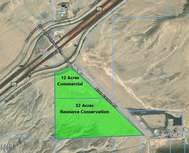 a view of a street with a building in the background