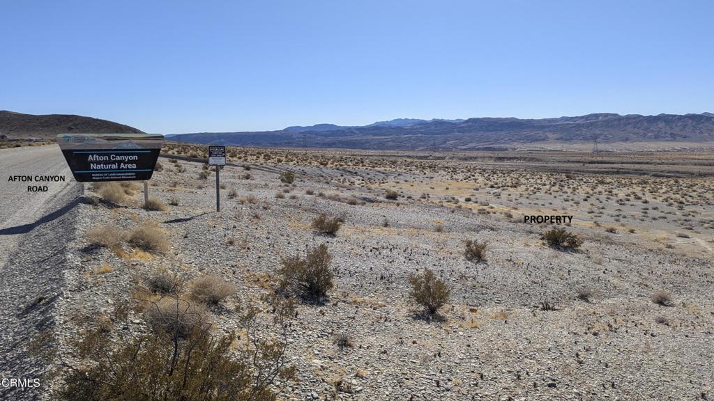 45101 Afton Canyon Road Baker, CA 92309 - Photo 20 of 29 a view of a dry yard with mountain and trees