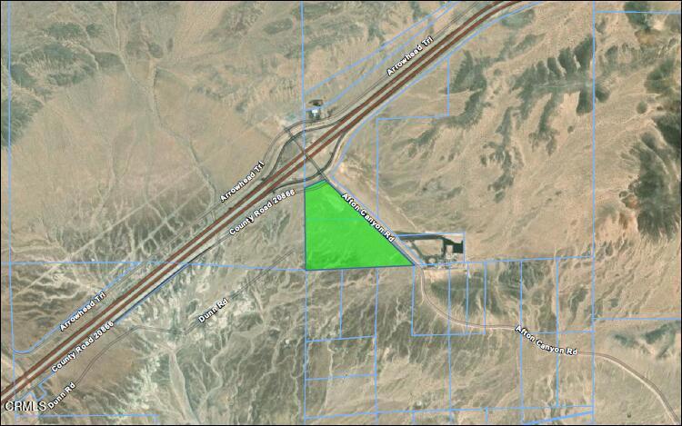 45101 Afton Canyon Road Baker, CA 92309 - Photo 23 of 29 a green field with lots of trees in the background