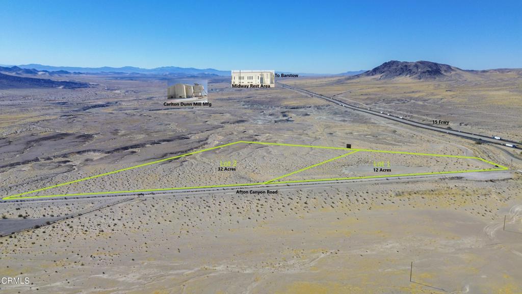 45101 Afton Canyon Road Baker, CA 92309 - Photo 9 of 29 a view of a dry yard with wooden fence