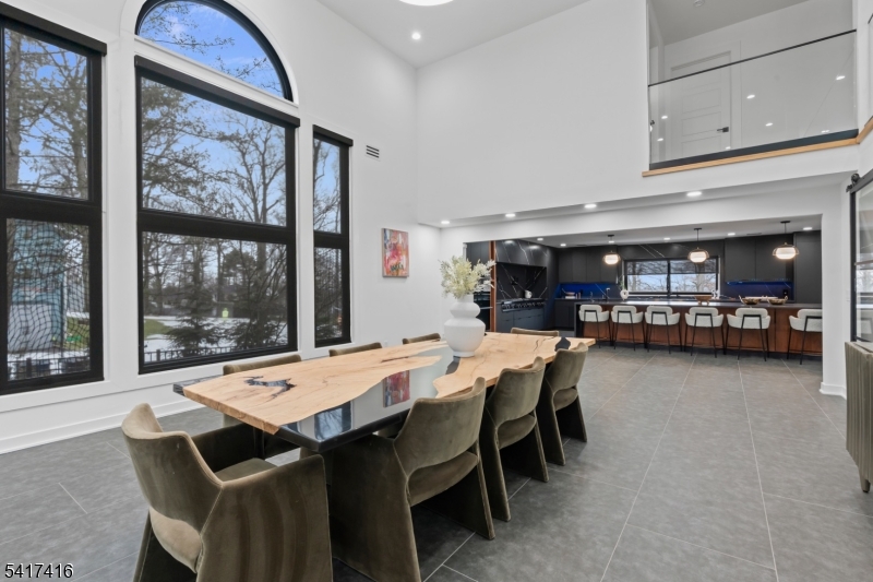84 County Rte 635 Livingston, NJ 07039 - Photo 12 of 30 a view of a dining room with furniture window and outside view