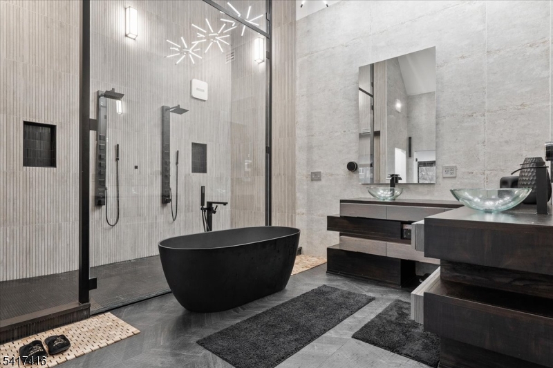 84 County Rte 635 Livingston, NJ 07039 - Photo 19 of 30 a living room with a couch and a potted plant