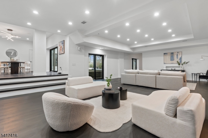 84 County Rte 635 Livingston, NJ 07039 - Photo 24 of 30 a living room with furniture and a large window