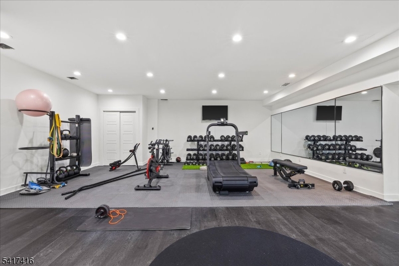 84 County Rte 635 Livingston, NJ 07039 - Photo 26 of 30 a view of a room with gym equipment