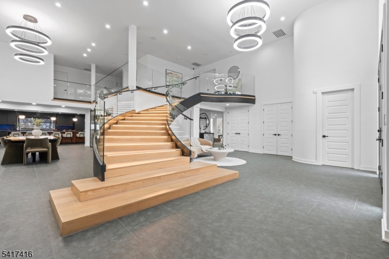 84 County Rte 635 Livingston, NJ 07039 - Photo 3 of 30 a view of entryway and hall