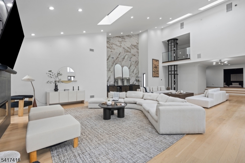 84 County Rte 635 Livingston, NJ 07039 - Photo 7 of 30 a living room with furniture