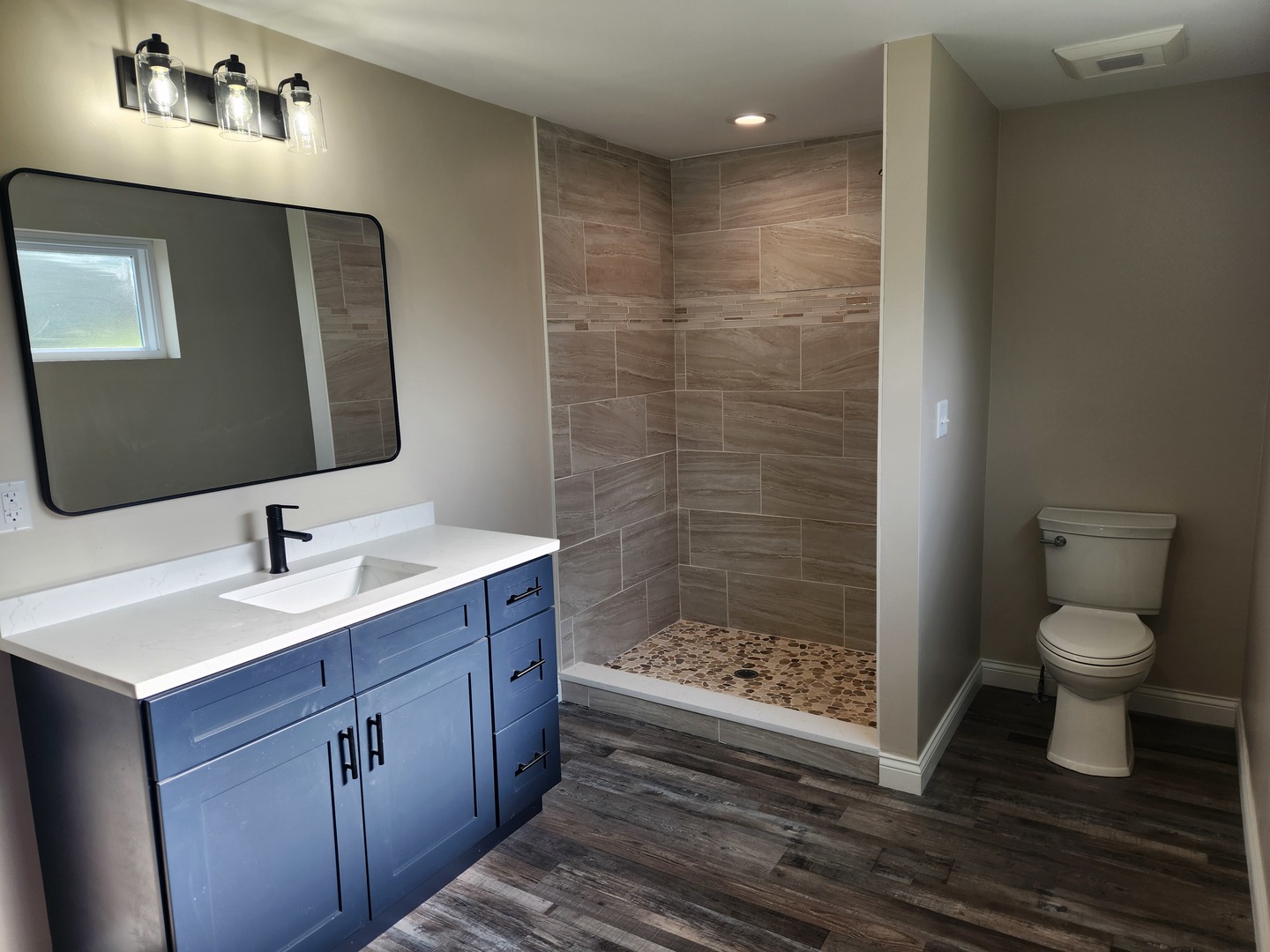40 Lippincott Road Fox Lake, IL 60020 - Photo 19 of 22 a bathroom with a toilet a sink and mirror