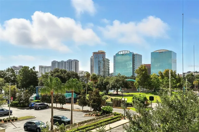 a view of a swimming pool with outdoor seating
