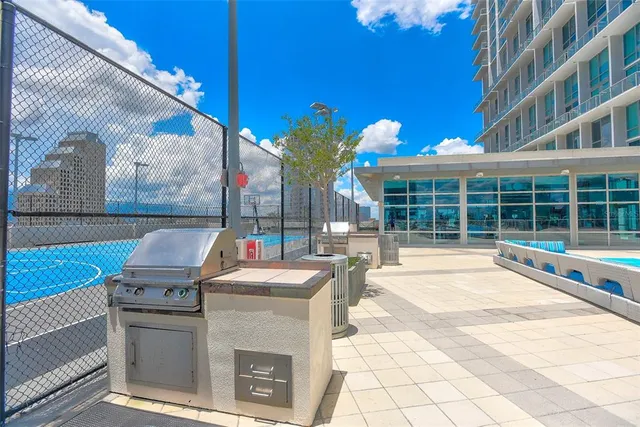 a view of a swimming pool with sitting area