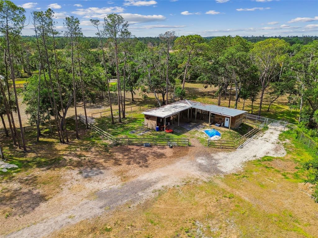 2853 Saffold Road Wimauma, FL 33598 - Photo 61 of 62 a view of a house with a yard
