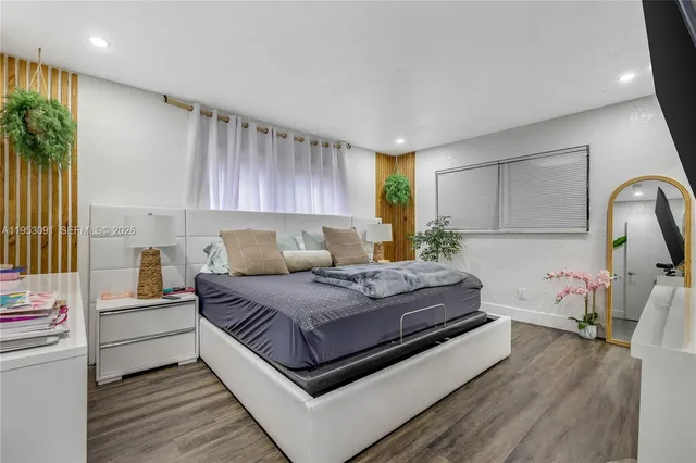 a bathroom with a sink double vanity and a mirror