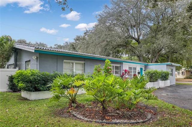 a view of a garden with a fountain