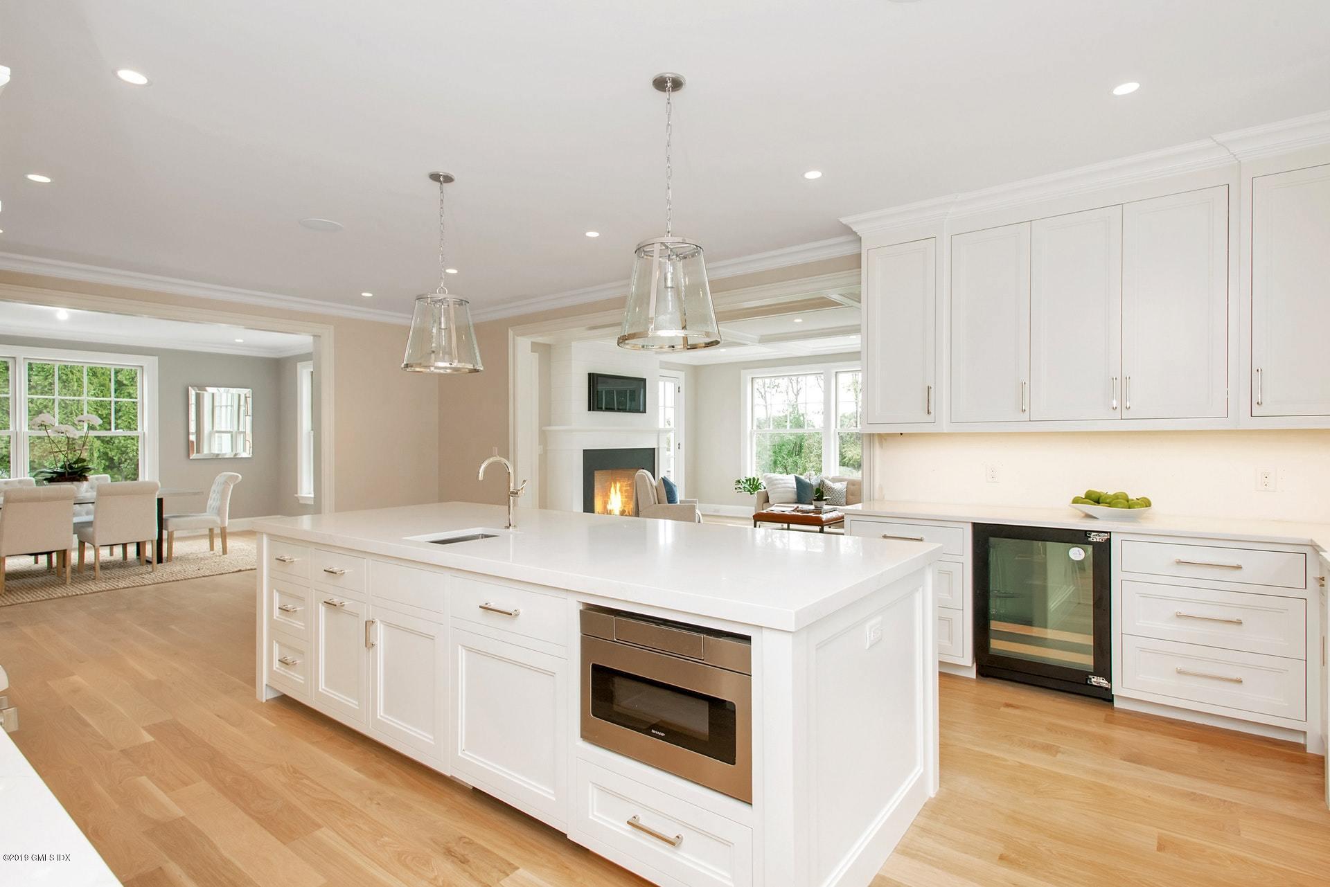 53 Sheep Hill Road Riverside, CT 06878 - Photo 6 of 10 a kitchen with a stove and a sink