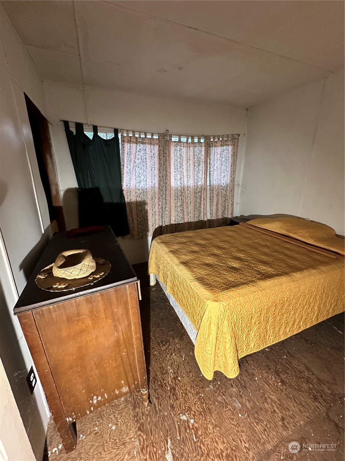 2020 Province Road Point Roberts, WA 98281 - Photo 5 of 14 a bedroom with a bed and window