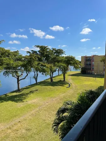a view of a swimming pool with an ocean view