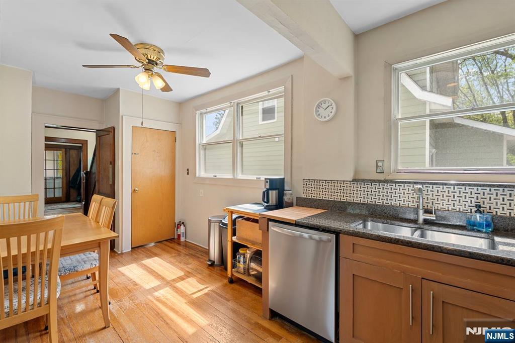 294 Sylvan Street Rutherford, NJ 07070 - Photo 12 of 29 a kitchen with a sink appliances and a window