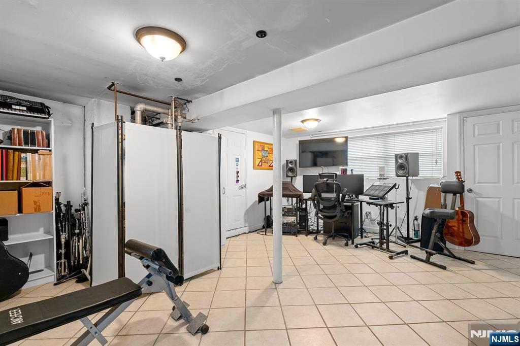 294 Sylvan Street Rutherford, NJ 07070 - Photo 21 of 29 a view of a room with gym equipment