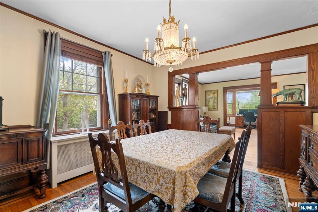 294 Sylvan Street Rutherford, NJ 07070 - Photo 9 of 29 a view of a dining room with furniture window and wooden floor