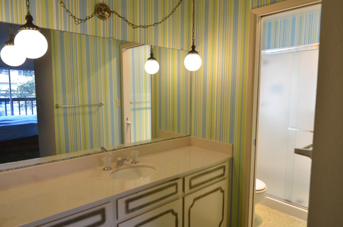 321 Middle Road Belmont, CA 94002 - Photo 11 of 17 a bathroom with a sink and a mirror