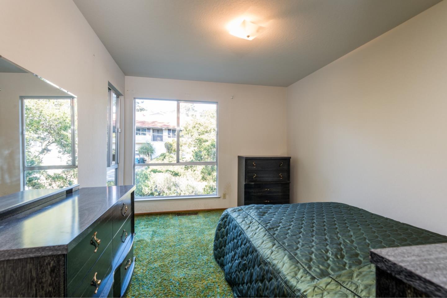 321 Middle Road Belmont, CA 94002 - Photo 12 of 17 a bedroom with a bed and a window